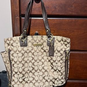 Coach shoulder bag tan canvas with the coach “c” logo
